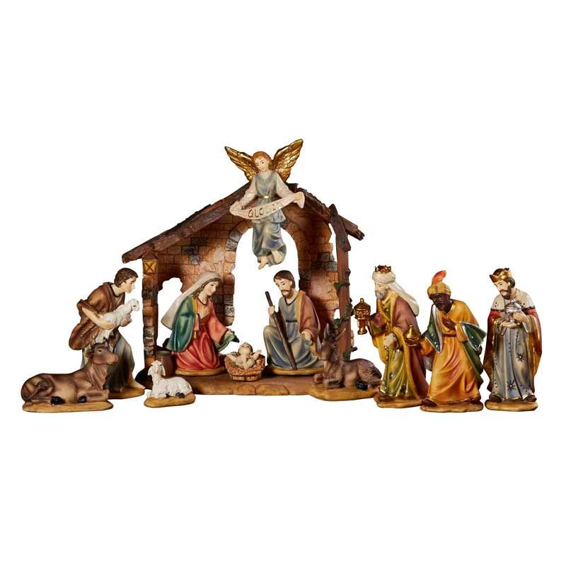 12-piece Nativity set with creche, Holy Family, Wise Men, shepherd, animals, and guardian angel.
