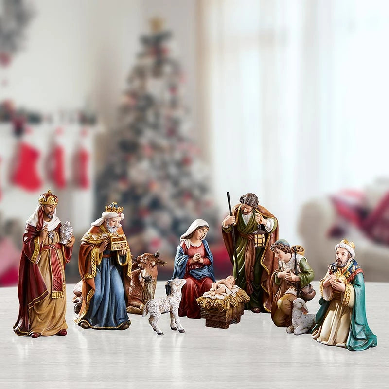 Catholic Christmas Nativity set designed by Michael Adams featuring the Christ Child and worshiping figures.