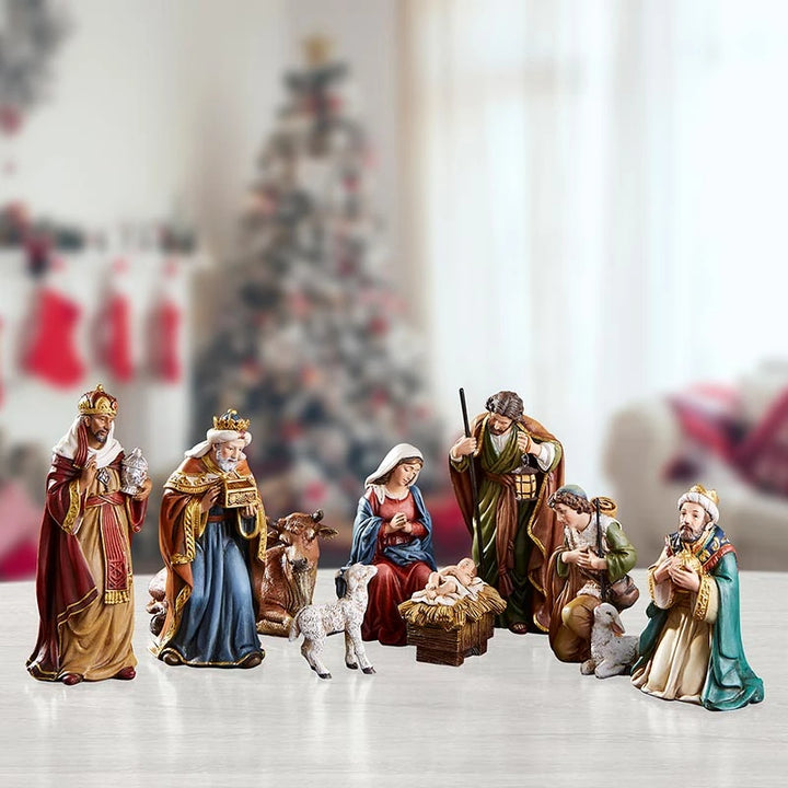 Catholic Christmas Nativity set designed by Michael Adams featuring the Christ Child and worshiping figures.