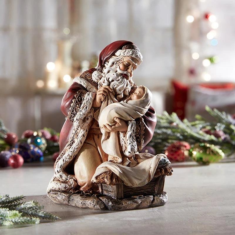 1. Adoring Santa with Baby Jesus figurine for mantel, shelf, tabletop, and faith-centered Christmas décor.
