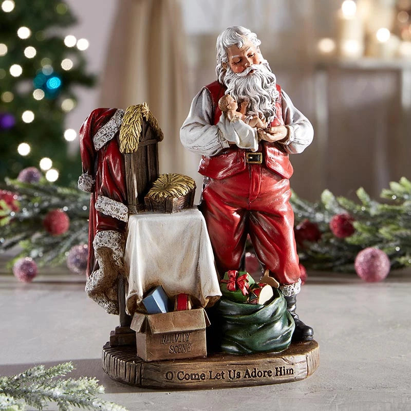 Adoring Santa with Baby Jesus figurine for mantel, shelf, tabletop, and faith-centered Christmas décor.