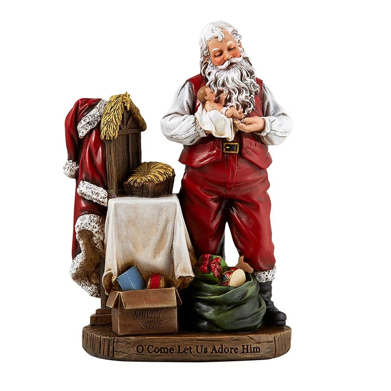 8 inch Adoring Santa figurine holding Baby Jesus in a detailed resin Christmas design.