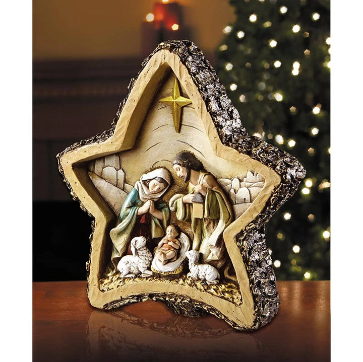 Catholic star-shaped Nativity decoration crafted from stoneresin with Holy Family Christmas imagery.