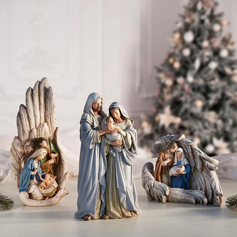 Gift-boxed Adoring Family Statue featuring a peaceful Holy Family scene for Catholic Christmas décor and religious gifting.