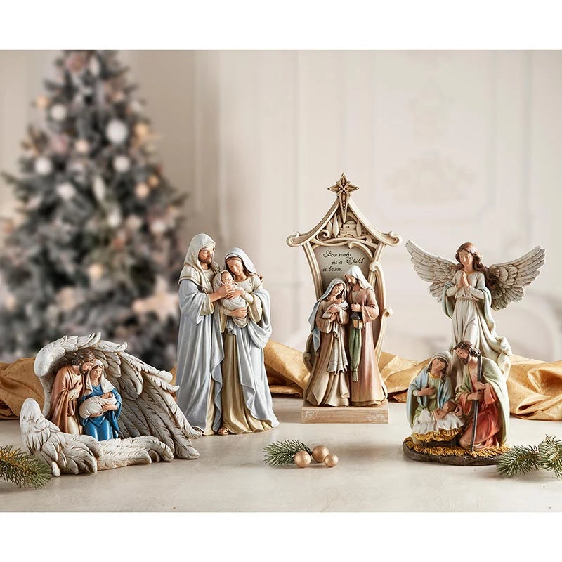 Gift-boxed Adoring Family Statue featuring a peaceful Holy Family scene for Catholic Christmas décor and religious gifting.