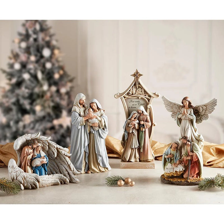 Gift-boxed Adoring Family Statue featuring a peaceful Holy Family scene for Catholic Christmas décor and religious gifting.