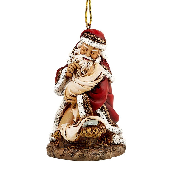 4.5 inch Adoring Santa Ornament featuring Santa holding Baby Jesus in a detailed resin design.