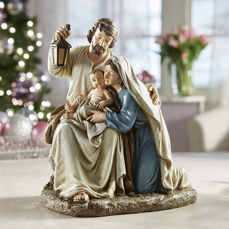 Detailed resin Holy Family Christmas decoration for faith-centered seasonal décor and gifting.