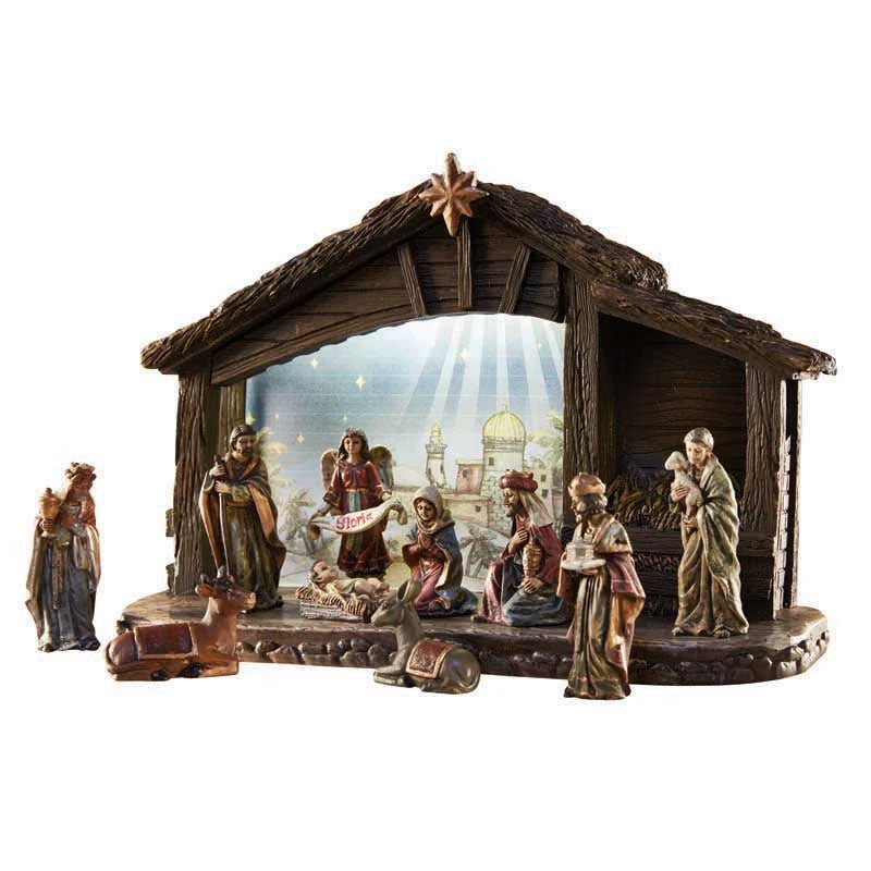 11-piece Nativity set with 8 inch lighted stable, Holy Family, Wise Men, shepherds, angel, and animals.
