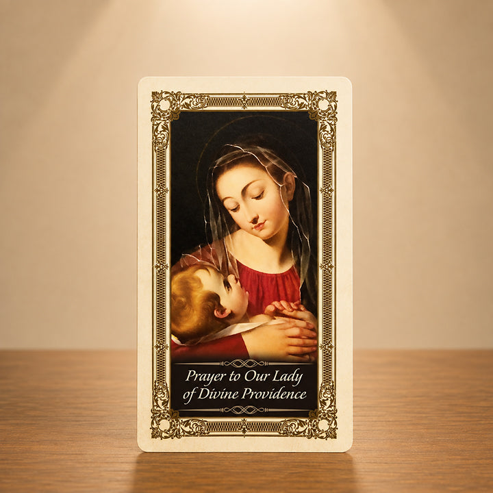 Our Lady of Divine Providence Prayer Card with Blessed Virgin Mary and Child Jesus artwork and gold colour accents