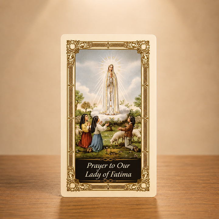 Our Lady of Fatima Prayer Card with Virgin Mary appearing to the three shepherd children and gold colour accents