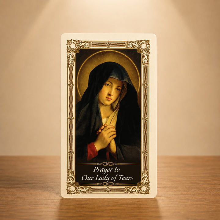 Our Lady of Tears Prayer Card with sorrowful Virgin Mary artwork and gold colour accents
