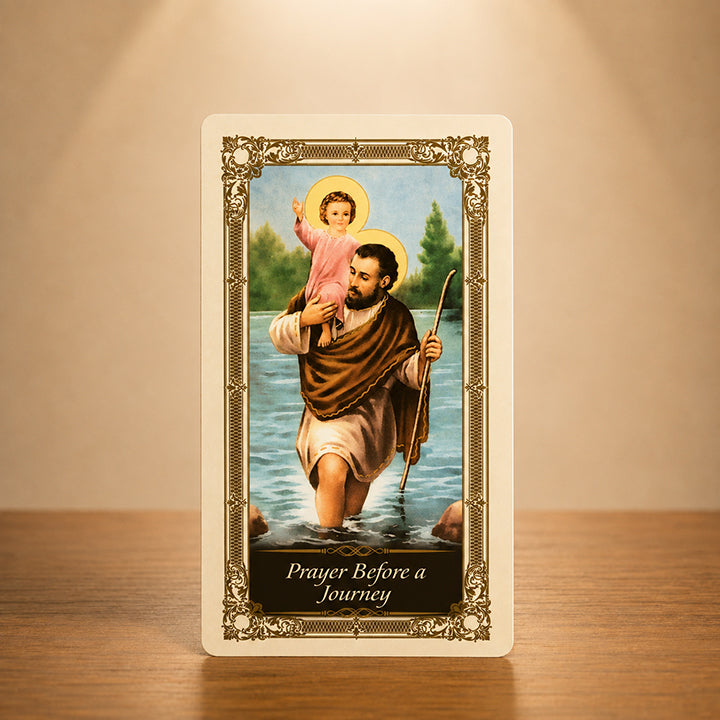 Prayer Before a Journey prayer card with St. Christopher carrying the Christ Child