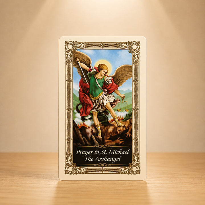 St. Michael the Archangel prayer card with Catholic artwork of St. Michael defeating evil