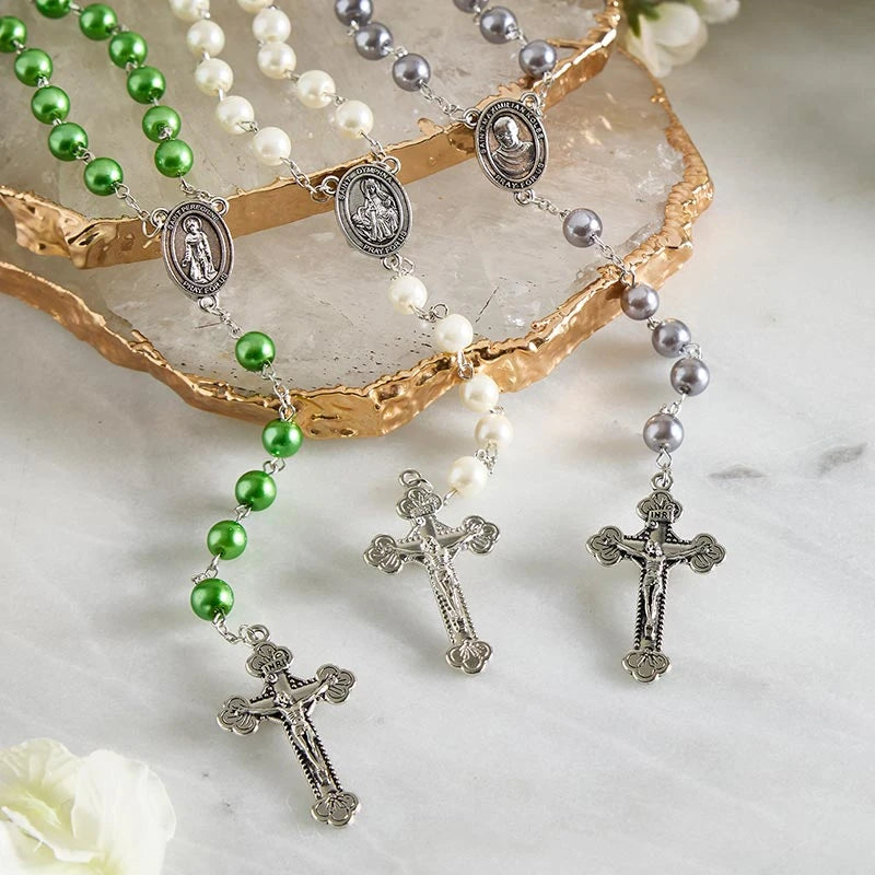 Saint Maximilian Kolbe Rosary with 7 mm pearl beads, silver-plated accents, 2-inch crucifix, and saint centerpiece.
