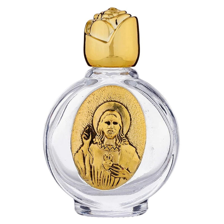 Catholic holy water glass bottle display featuring Sacred Heart design.