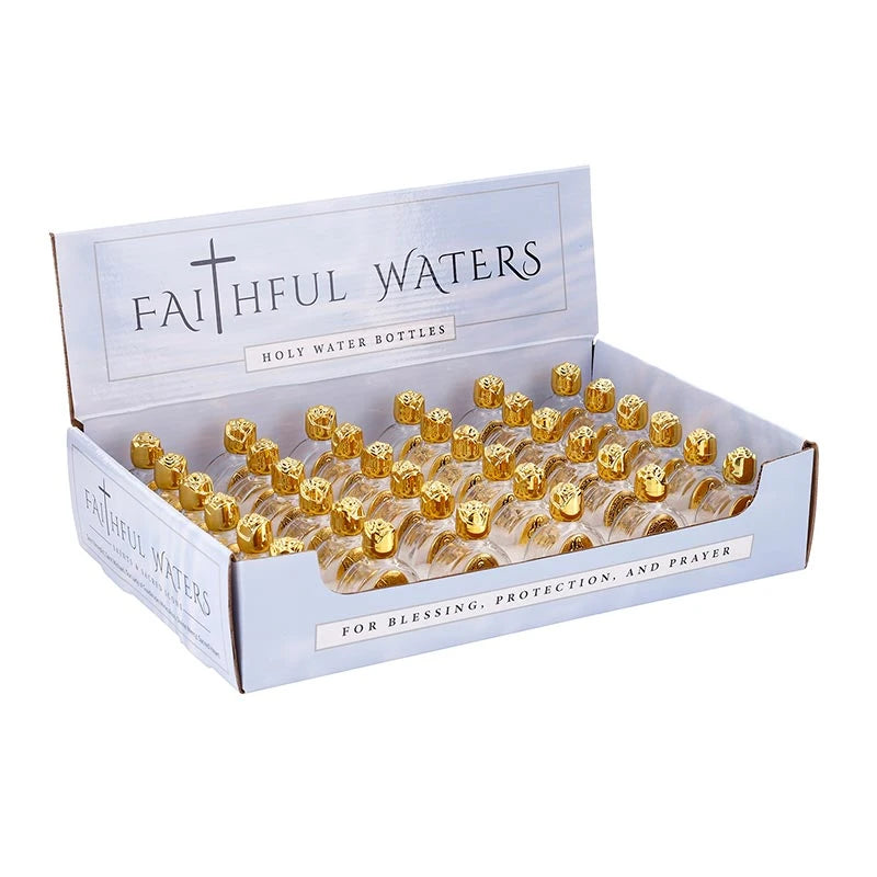 Saints Holy Water Glass Bottles Display with 36 pre-filled Catholic bottles featuring gold-tone caps and assorted saint and Marian designs.
