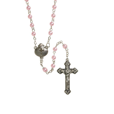 Girl's Pink Baptism Rosary A wonderful Baptism rosary from Milagros. This Baptism Rosary features 5 mm Imitation Pearl Beads with Double Capped Our Father Beads.